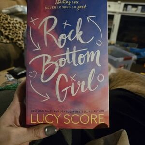 Rock Bottom Girl Book by Lucy Score